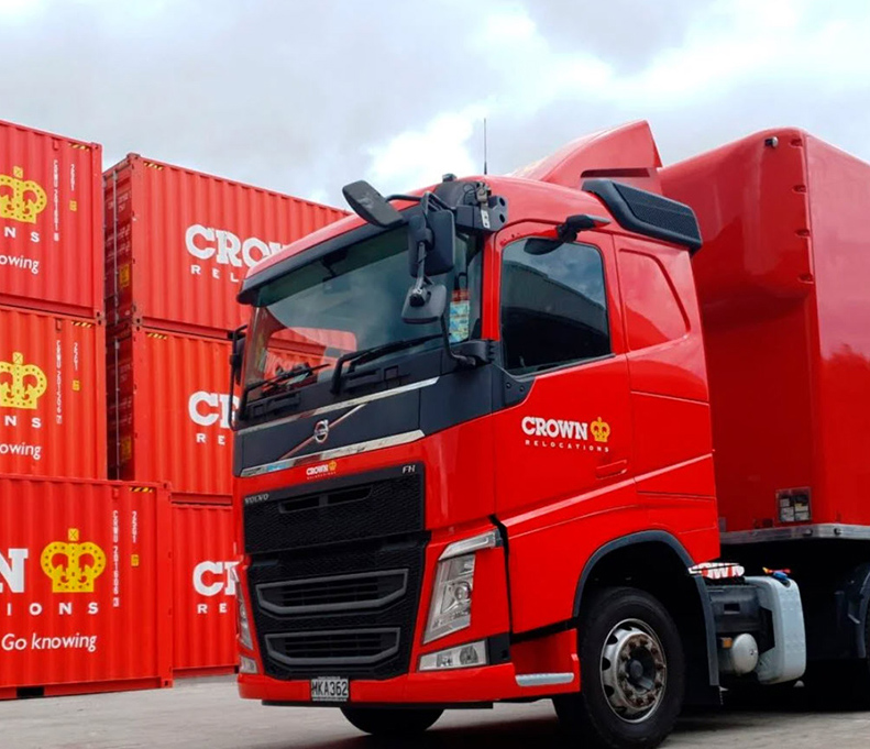 Crown Relocations truck and shipping containers
