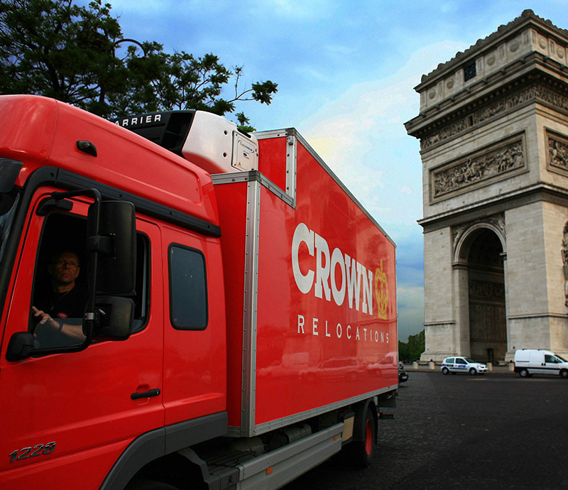 Crown Relocation 1220 truck at Arc de triomphe Paris city at day