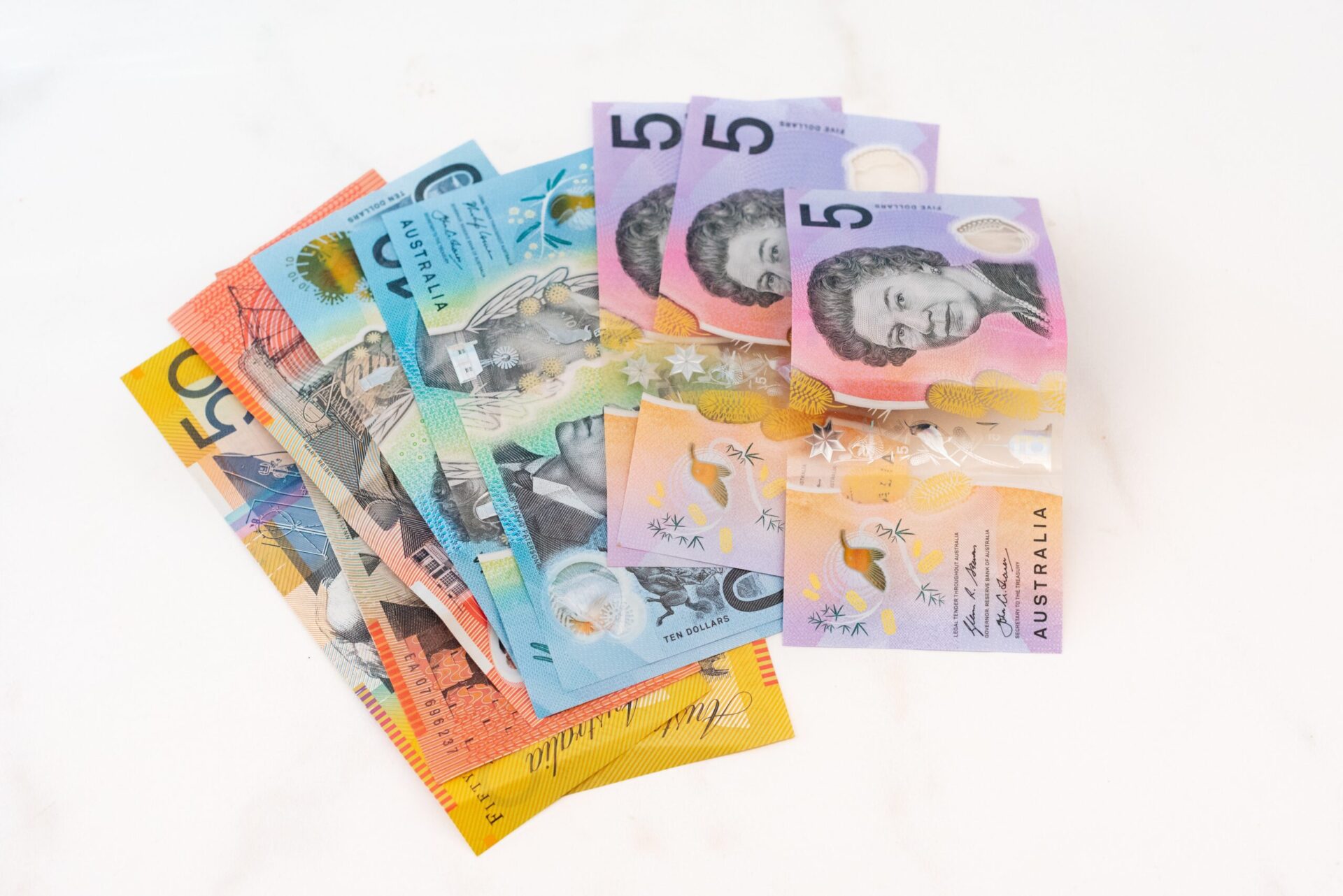 Australian money background showing $5, $10 and $50 notes