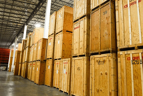 carton boxes and goods on wooden pallet