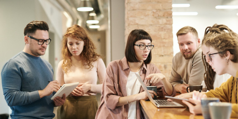 Young professionals discussing in office