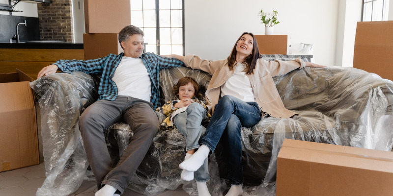 The family on the couch is ready to move