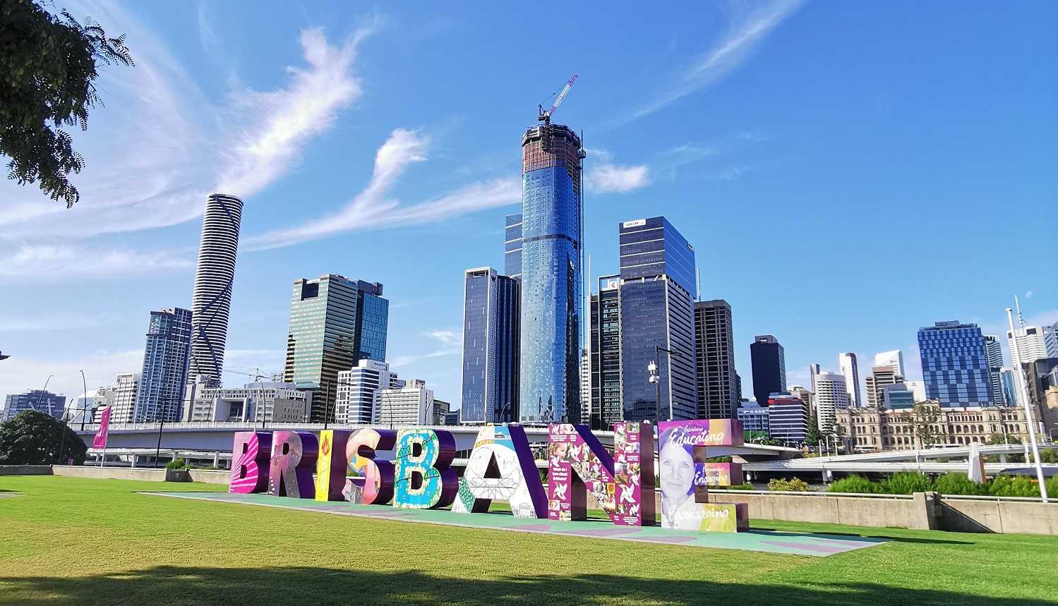 Brisbane sign at South Bank Parklands, a popular photo spot with the city skyline in the background
