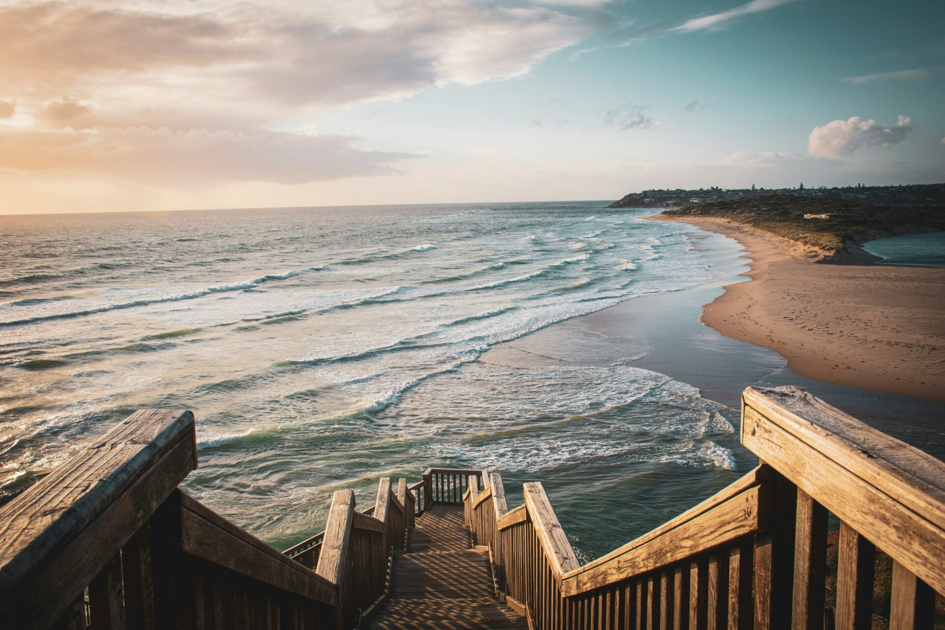 South Port Beach boardwalk at sunset in Adelaide, South Australia