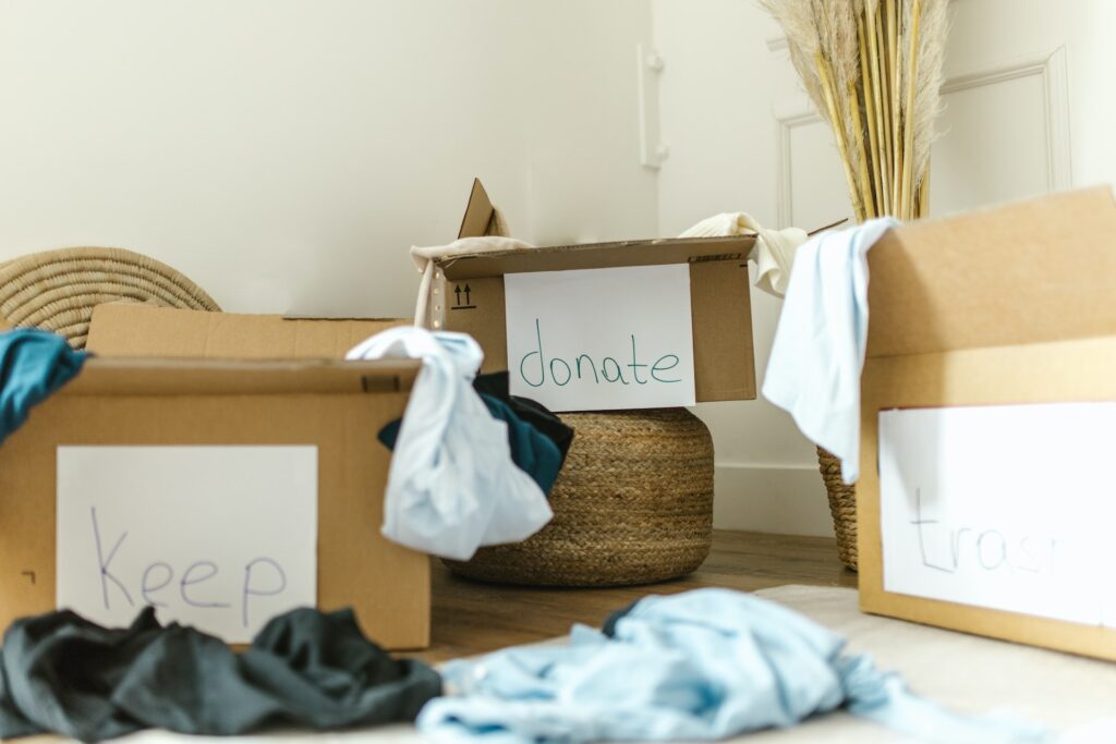 Clothes being sorted into boxes
